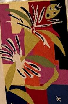 Needlepoint of Matisse-style florals in a vase